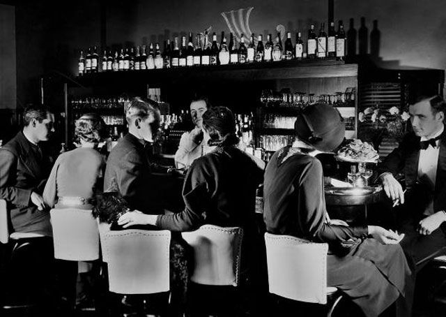 "Celebrity patrons enjoying drinks at this unident. smart, modern speakeasy which is popular w. Greta Garbo & Beatrice Lillie where they cand bring their dogs while eating & drinking w/o fear of police prohibition raids."